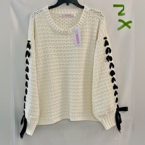 Chic Cream Sweater with Black Ribbon Details